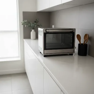 Ninja Foodi Digital Air Fry Oven flipped up against a backsplash, highlighting its space-saving design in a modern kitchen.